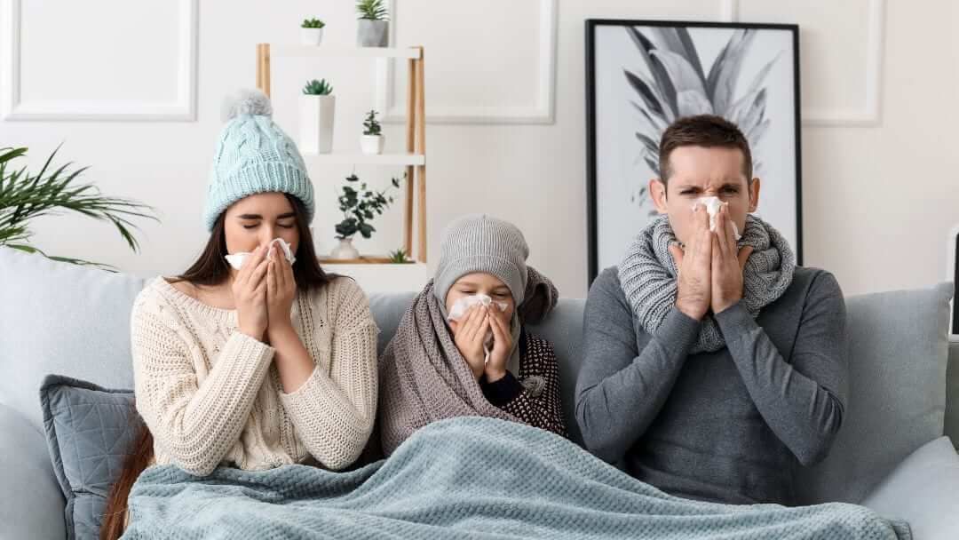 Winter cold and flu prevention strategies combining vitamin supplements (D and C), raw garlic, zinc lozenges, herbal teas with echinacea and elderberry, quality sleep, and hydration to strengthen immunity against seasonal respiratory illness.